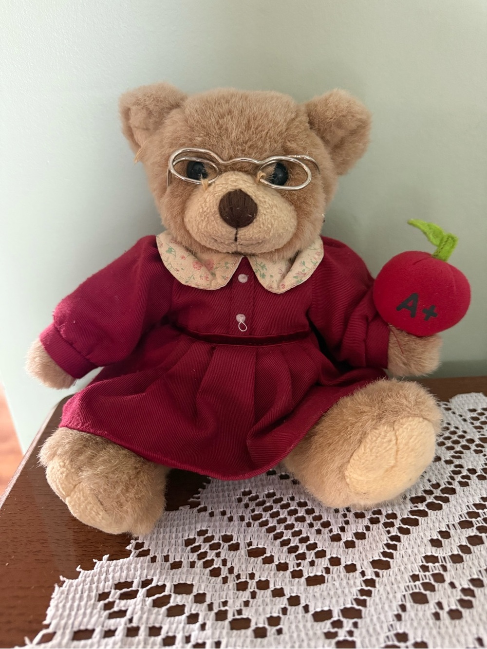 Classic Brown Teddy Bear in Red Dress with Glasses and Apple